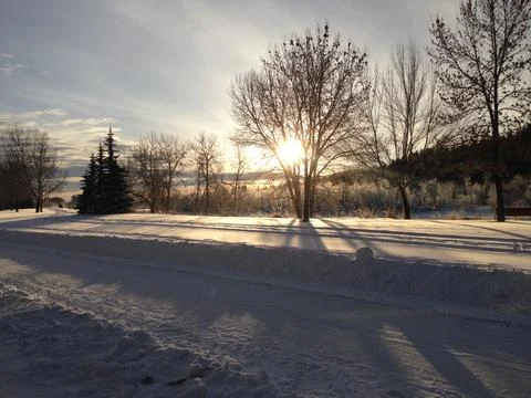 Evening winter walk along the river Stock Photos