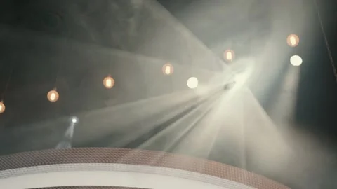 An event hall with spots and projectors at a night party. Stock Footage 221579001