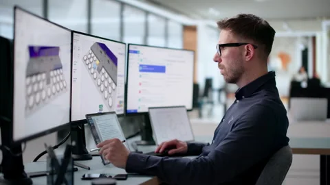 Event Planner Carefully Organizing Schedule Using Laptop Stock Footage 339887048