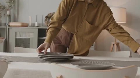 Event Planner Setting Christmas Dinner Table Stock Footage 321379026