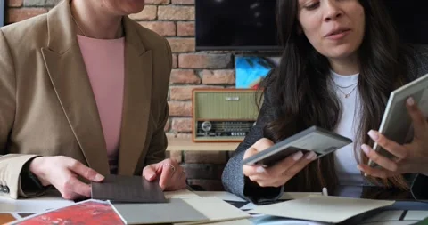 Event planners evaluating theme colors in collaborative meeting. Team discusses Stock Footage 276407008