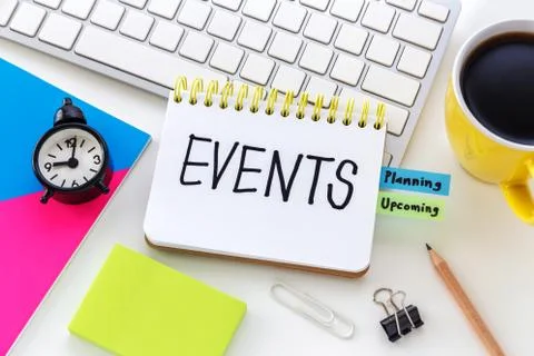 Events word on notebook with clock notepad on computer desk for event plannin Stock Photos