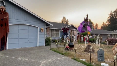 Everett, WA, USA - 20 October 2022. House yard decorated for Halloween with Stock Footage 249472955