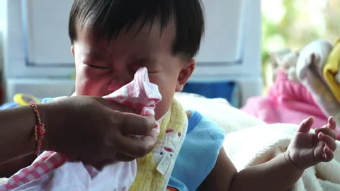 Every tear is a step in development, showing the raw and honest growth  Stock Footage 302813058