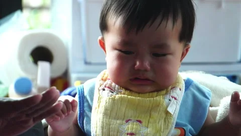 Every tear is a step in development, showing the raw and honest growth of a chil Stock Footage 302813075