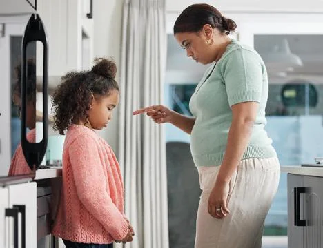 For every wrongdoing, theres an opportunity to learn. Shot of a little girl b Stock Photos
