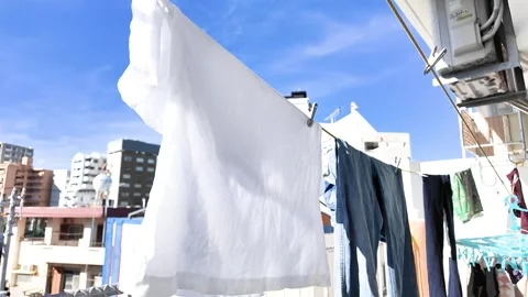 Everyday Laundry Under the Tropical Sun in Naha, Okinawa - Dec 4, 2024 Stock Footage 299128506
