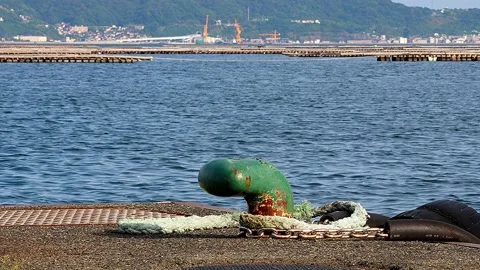 Everyday Setouchi harbor scenery with bollard and oyster rafts, 4K 库存影片 342496943