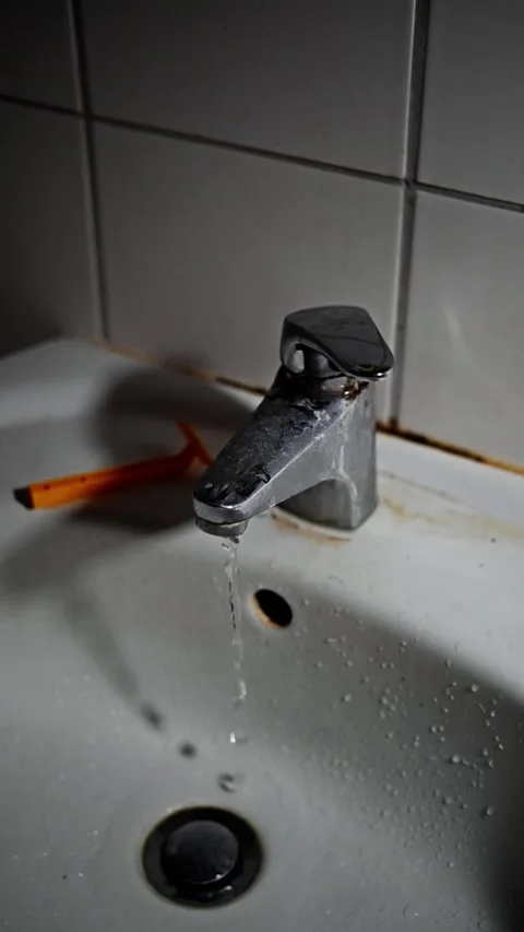 Everyday Sink With Water Flow, Simple Bathroom Setting Featuring Dripping Faucet Video stock 323094004