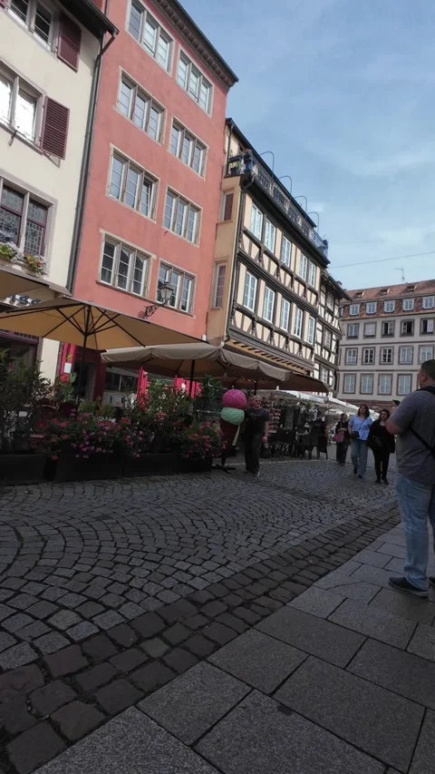 Everyday street life and architecture in central Strasbourg Stock Footage 344554553