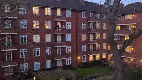 EVERYONE CLAPPING FOR ESSENTIAL WORKERS DURING COVID-19 UK LOCKDOWN, 4K Stock Footage 127592759