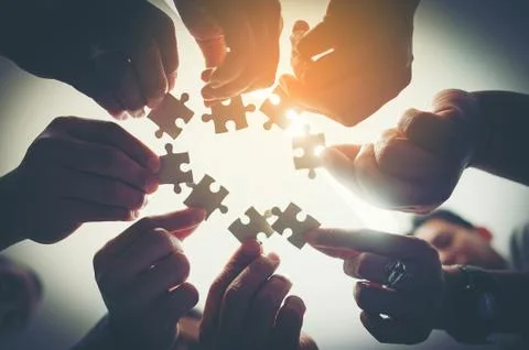Everyone is an important jigsaw at work. 写真素材