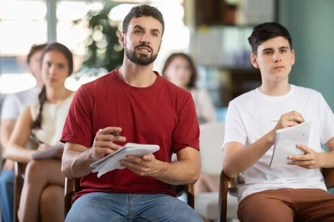 Everyone listening to lecture in classroom Stock Photos