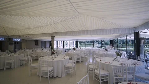 Everything is set and ready for the wedding party in an outdoor restaurant. Stock Footage 97615966