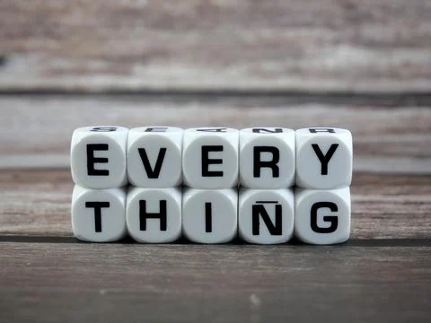 Everything wording  or text on white dice with black wooden background.Copy.. Stock Photos