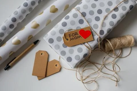 Everything for wrapping a present lying on the table Foto stock
