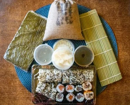 Everything you need to create sushi. Rice, nuri, ginger, soy sauce, wasabi Stock Photos