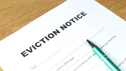 Eviction Notice put on the desk Stock Footage 233463793