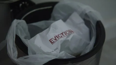 Eviction Notice in Trash Can 動画素材 325105897