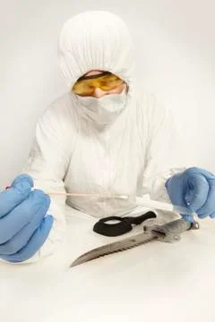 Evidence of cold weapon in protective plastic tube - unpacking Stock Photos