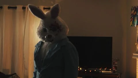Evil Bunny Turns Head Video stock 248458083