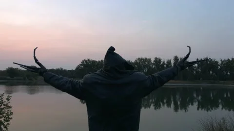 Evil creature summoning at a lagoon Stock Footage 209689449