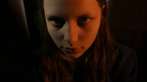 Evil demonic teen girl with a sinister s... | Stock Video | Pond5