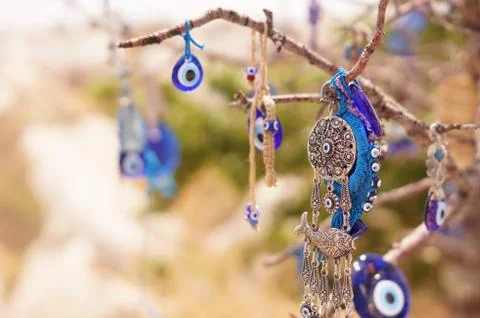 Evil eye bad on tree Stock-Fotos