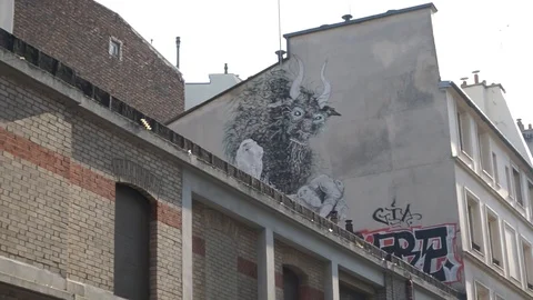 Evil Graffitti On the Wall In Paris Stock Footage 113763951