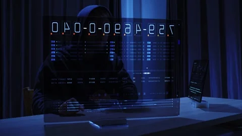 Evil Hacker in Hoodie Breaks into Data Servers Stock Footage 249233708