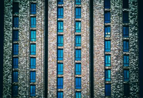 Evil looking front of skyscraper background Stock Photos