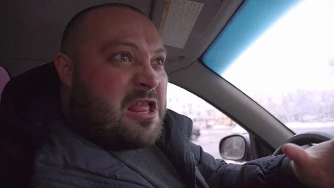 Evil man in the car Stock Footage 94538269