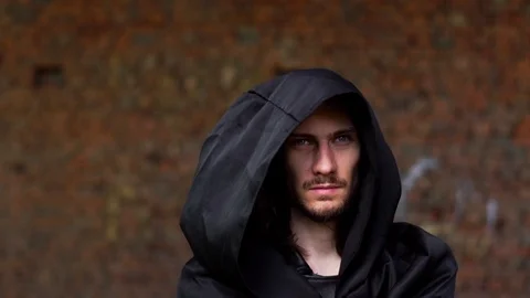 An evil monk in the hood Stock Footage 112245965