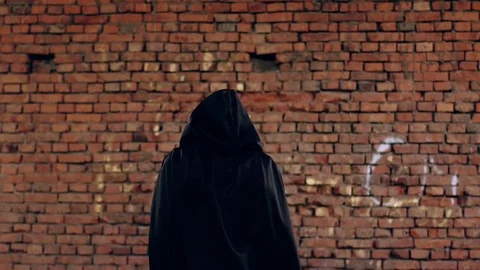 An evil monk in the hood Stock Footage 114644378