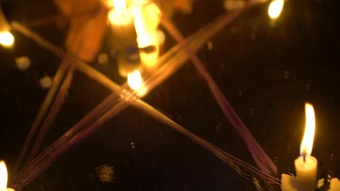 Evil pentagram and doll burning on mirror, creepy occult ritual, black magic Stock Footage 118504064