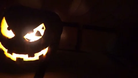 Evil pumpkin with a candle Stock Footage 85875354