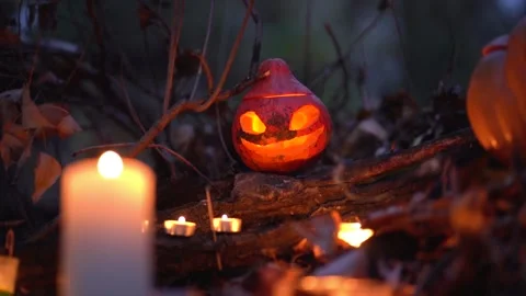 Evil pumpkin head – happy Halloween holiday attribute on city street. Magic plac Stock Footage 139201215