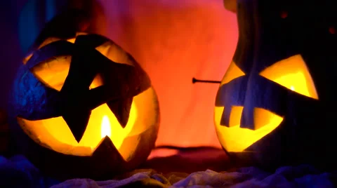 Evil pumpkin in night light glow, vapor or mist flowing around. Traditional Stock Footage