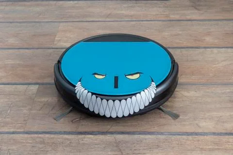 Evil robots concept. Robot vacuum cleaner with evil grin Stock Photos