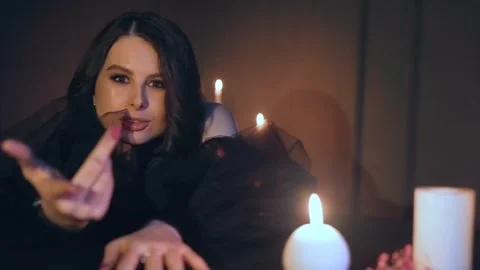 Evil sorceress preparing for making rite and sacrifices at night use witchcraft. Stock Footage 243318006