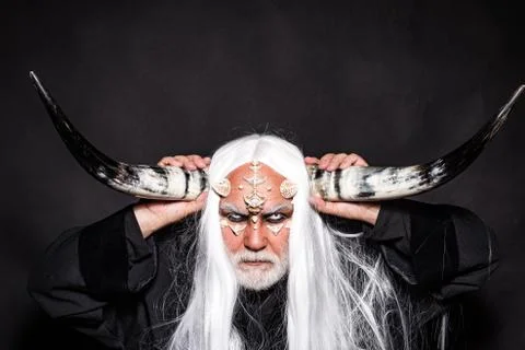 Evil vampire man. Horned Devil in his home - Ancient style. Monster with white Foto stock