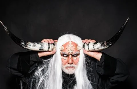 Evil vampire man. Horned Devil in his home - Ancient style. Monster with white Foto stock