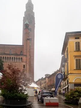 An evocative rainy day capturing the ancient charm of Cremona Italy's iconi.. Stock Photos