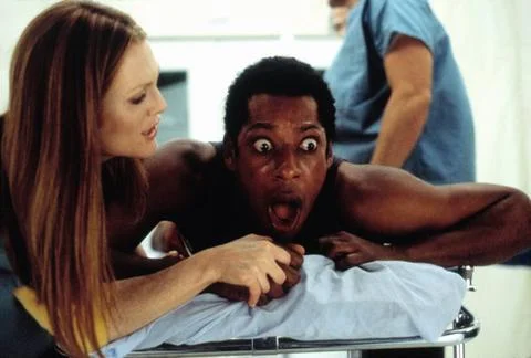  Evolution (2001) - filmstill Evolution (2001) Julianne Moore &amp; Orlando Jo... Foto stock