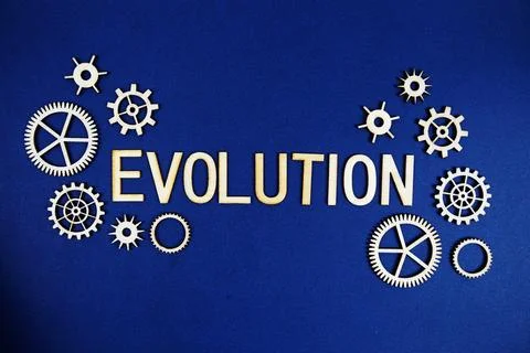 Evolution alphabet letters with gears element on navy blue background Stock Photos