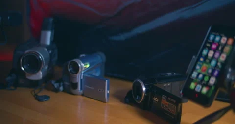 The Evolution of the Consumer Video Camera. VHS to iPhone 4K Stock Footage 167867075