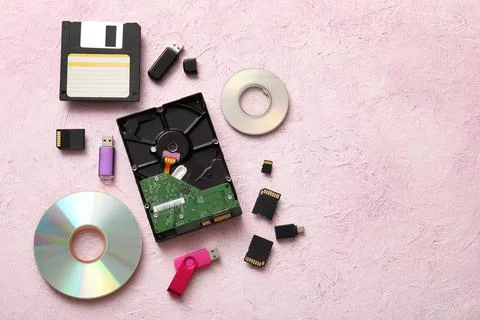 Evolution of data storage devices including floppy disk hard drive usb flash  Stock Photos