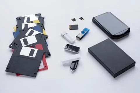 The evolution of digital devices for the transfer and storage of information. 스톡 사진