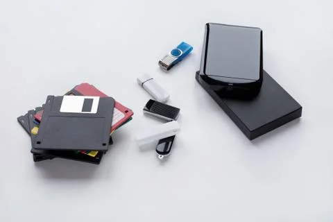 The evolution of digital devices for the transfer and storage of information. 스톡 사진