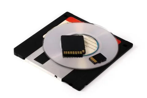 Evolution of electronic digital mediaisolated Floppy disk SD microsd mini com Stock Photos